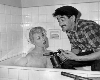 Nadine Tallier (convertida en Baronesa Nadine De Rothschild) y Maurice Gardett en la fiesta en su casa en París el 27 de marzo de 1961 de Unbekannt Unbekannt