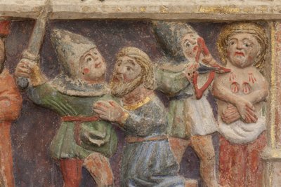 Retablo. piedra policromada. Segunda mitad del siglo XIV. Origen antigua iglesia parroquial de Torre de Rialb. (detalle) Registro medio. Panel izquierdo. Parte inferior: un oficial observa la escena de la decapitación de San Iscle y la amputación de los se de Unbekannt