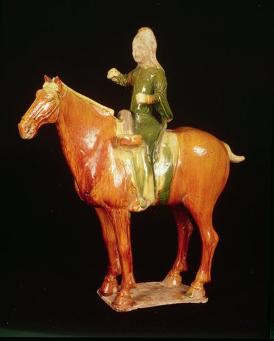 Figura vidriada de un tamborilero montado Dinastía T