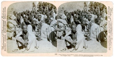 Prisioneros boxeadores capturados y llevados por la 6ª Caballería de EE.UU., Tientsin, China, 1901 de Underwood and Underwood