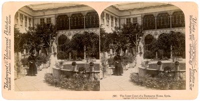 El patio interior de una casa de Damasco, Siria, 1900 de Underwood and Underwood