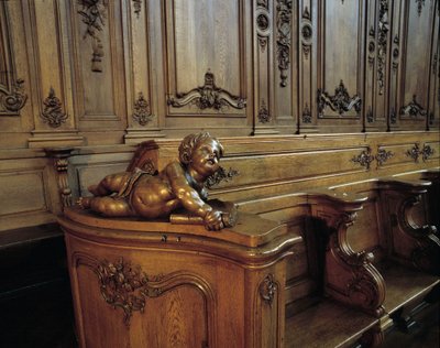 Arquitectura barroca: puesto de madera representando un ángel, atributo del evangelista San Mateo. Coro (siglo XVIII) de la Iglesia de San Esteban. Vista interna. Marmoutier, Bas Rhin. de Unknown artist