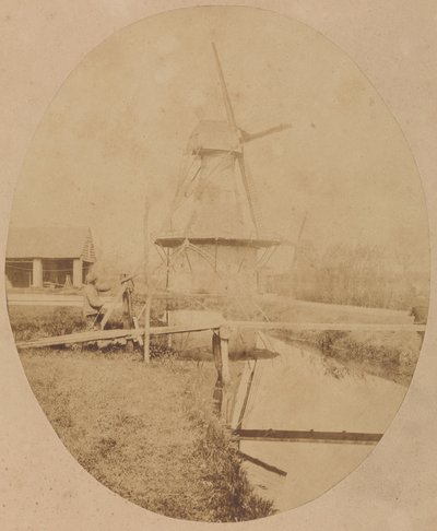 [Pintor con sombrero en el caballete pintando un molino de viento] de Unknown artist