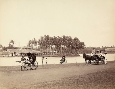 Rickshaw y carro a orillas de un río indio de Unknown photographer