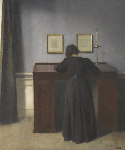 Ida de pie en un escritorio de Vilhelm Hammershøi