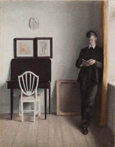 Interior con un joven leyendo de Vilhelm Hammershoi