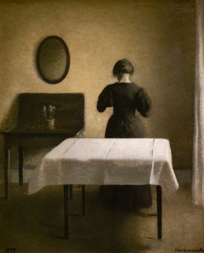 Interior con una mujer de espaldas de Vilhelm Hammershoi