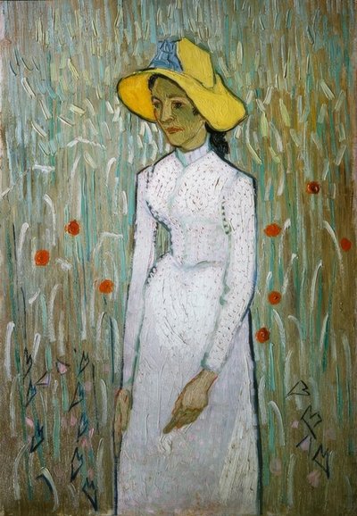 Joven muchacha, de pie frente a un campo de trigo de Vincent van Gogh