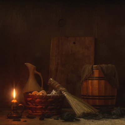 Naturaleza muerta rústica con velas de magnola