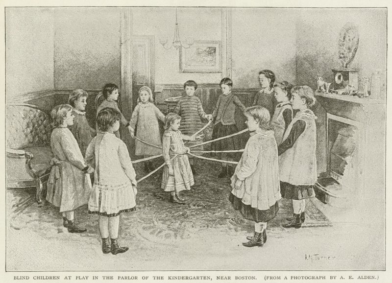 Niños ciegos jugando en el salón del jardín de infantes, cerca de Boston de American School