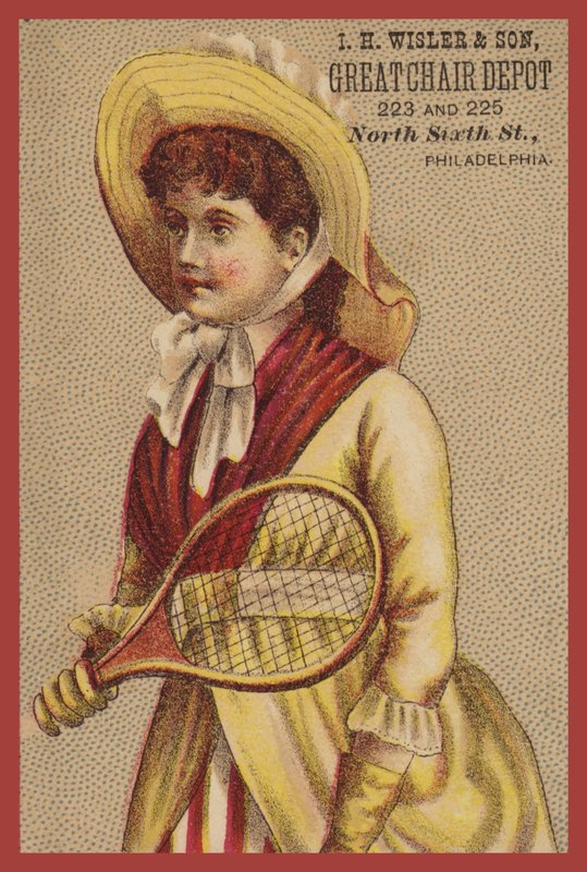 Niña sosteniendo raqueta de American School