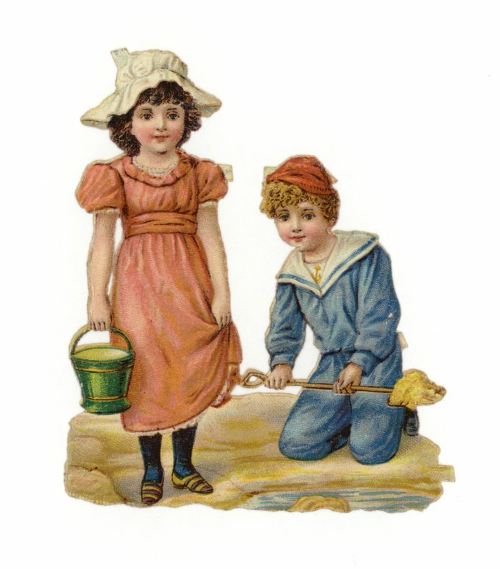 Niña y niño construyendo castillos de arena de American School