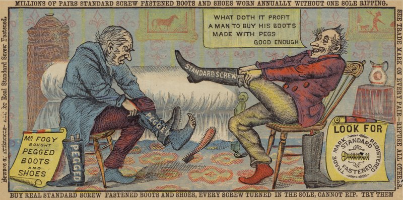 Hombres mayores probándose botas de American School