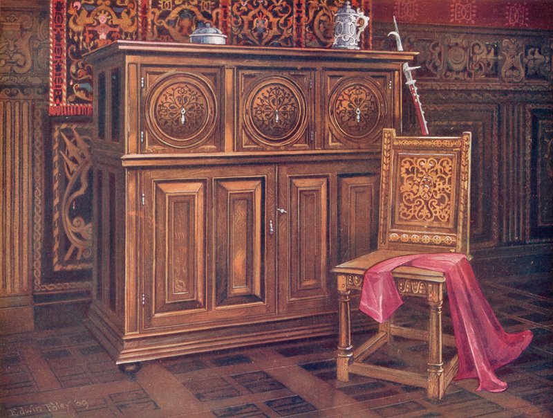 Gabinete de roble, con paneles convexos circulares, ornamento inciso de arabesco. Silla de nogal, con ornamento entrelazado de Edwin John Foley