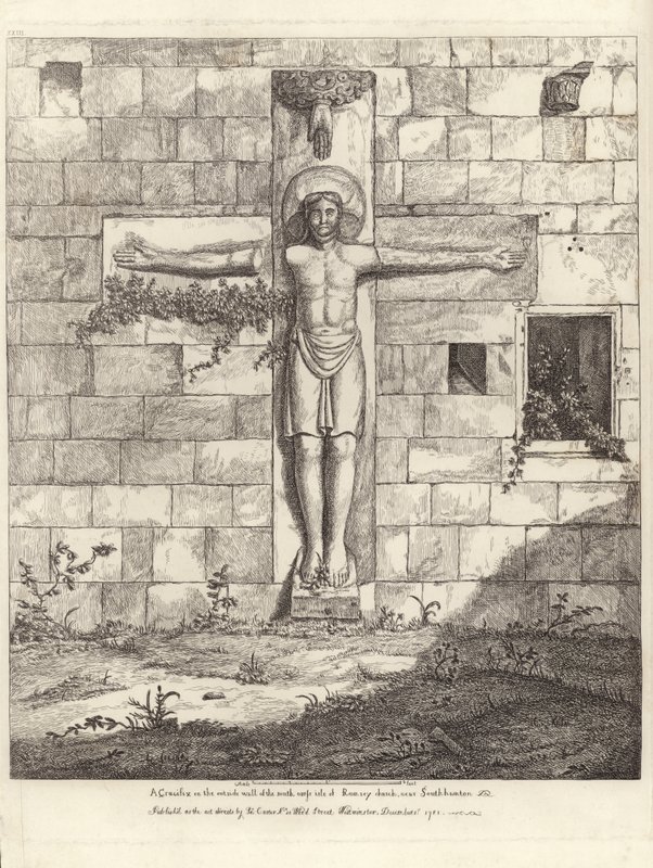 Un Crucifijo en la pared exterior del pasillo sur de la Iglesia de Rumsey de English School