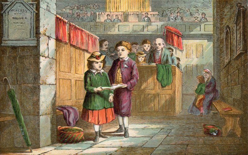 Hermano y hermana cantando himnos en la iglesia de English School