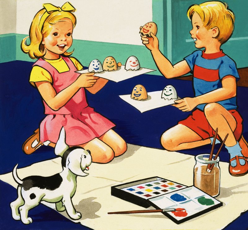 Niños pintando huevos de English School