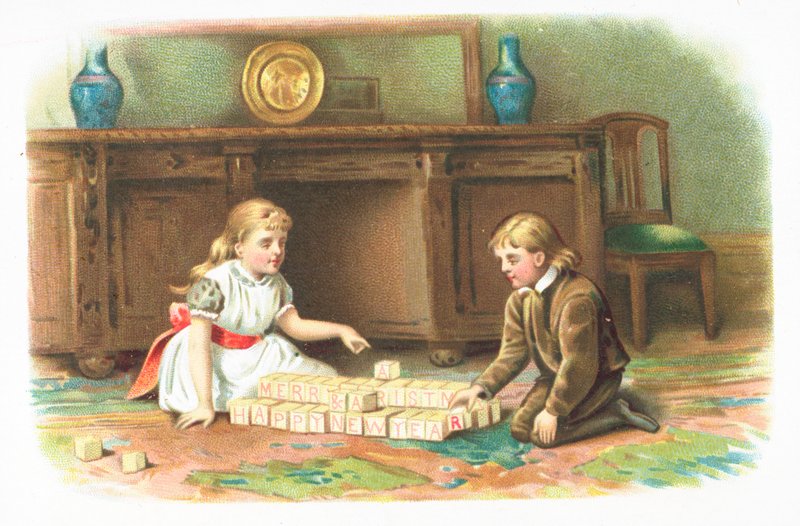 Niños jugando con bloques de construcción en el suelo, tarjeta de Navidad de English School