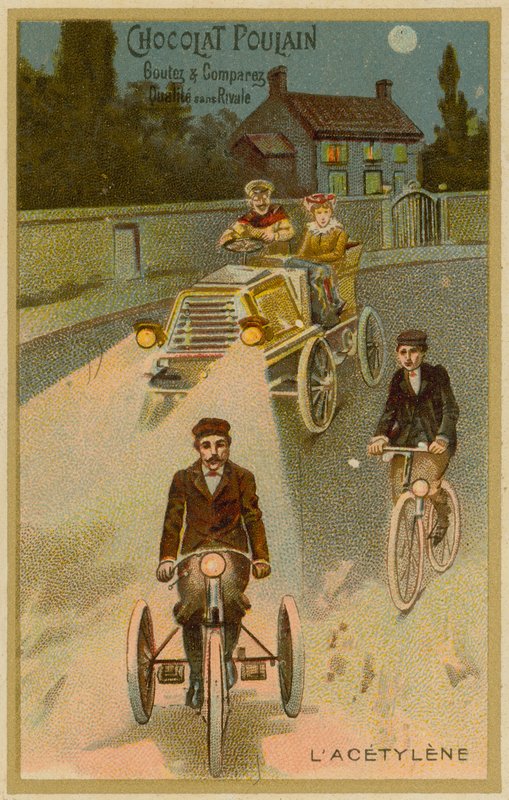 Faros de acetileno en un automóvil y una motocicleta de French School