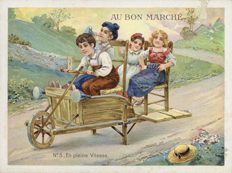 Niños jugando en una carretilla convertida de French School