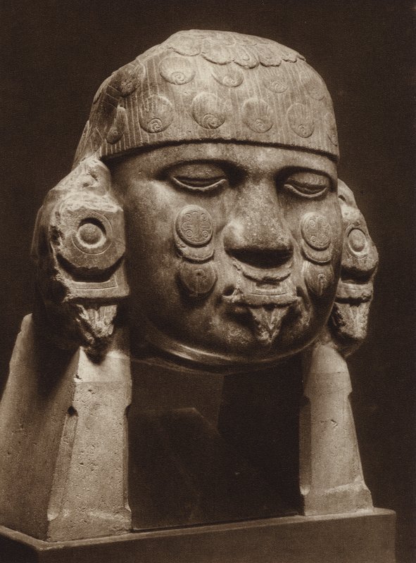 Mexico: Cabeza de diorita de la diosa Coyolxauhqui, Museo nacional (b/w photo) de Hugo Brehme