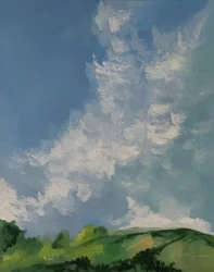 Colinas verdes entre nubes