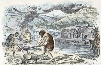 Prehistoria, edad del bronce: taller de fundición cerca de un asentamiento de zancos Grabado de "La nature et l