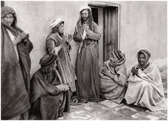 Un mulá enseñando una oración a un joven, Irak, 1925