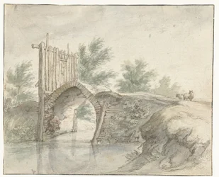 Puente de piedra con valla de madera