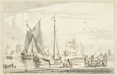 Orilla del río con algunos barcos