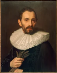 Retrato de un hombre, sosteniendo guantes, ligeramente hacia la izquierda