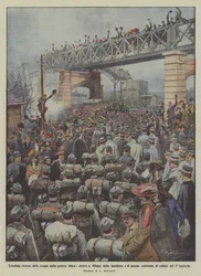 Triunfal regreso de las tropas de la guerra libia, llegada a Milán de la bandera y de algunos