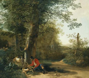 Campesino jugando con su perro mientras descansa en la linde de un bosque