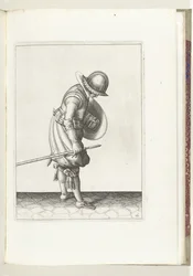 El ejercicio del escudo y la espiga: el soldado pone la espiga en el suelo junto a su pie derecho (n.º 16), 1618 El Nassausche Wapen-Handelinge, van Schilt, Spies, Rappier and the Targe: más allá de figuerlick representado, y enmarcado según el nuevo orden
