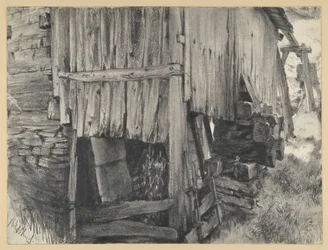 Cobertizo de madera alrededor de una rueda de molino