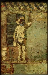 Pintor en una pared de casa