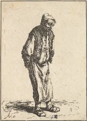 Campesino con las manos detrás de la espalda