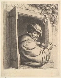 Fumador junto a la ventana