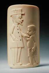 Placa con figuras de un hombre europeo y una mujer africana, Congo