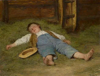 Niño dormido en el heno