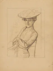 Mujer sentada con sombrero