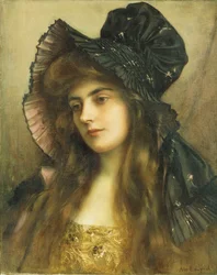 Una joven belleza con sombrero negro