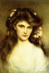 Una joven belleza con flores en el cabello