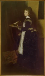 Niña llevando cabeza de jabalí