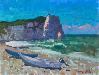 Acantilados junto al mar y barcos