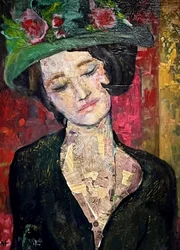 Mujer elegante con sombrero verde