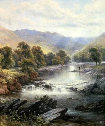 Un pescador en un valle fluvial