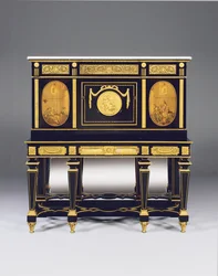 Gabinete sobre soporte, incorporando paneles de marquetería y elementos constructivos de una cómoda de David Roentgen, los montajes del friso atribuidos a Francois Redmond