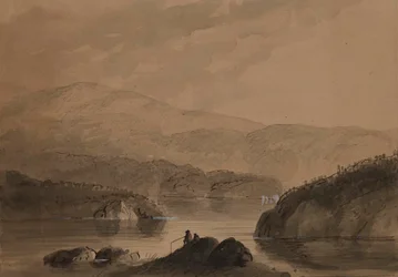 Vista de hombres pescando desde una roca en un lago