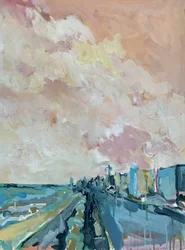 Paisaje urbano con cielo rosado